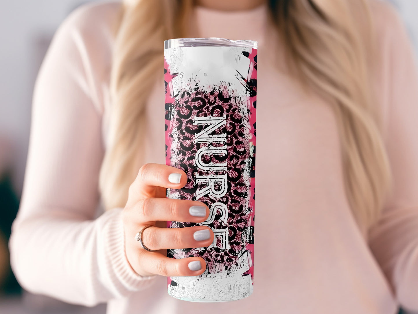 Tumbler with leopard print and "Nurse" text held by a woman.