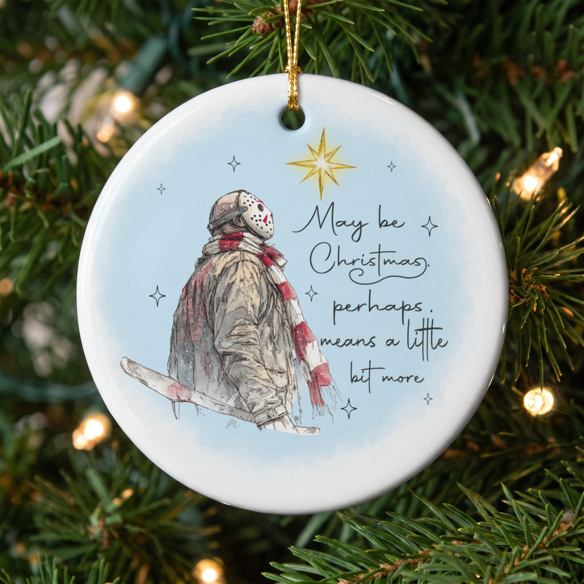 Ornament with Jason Voorhees illustration and quote "May be Christmas, perhaps, means a little bit more."