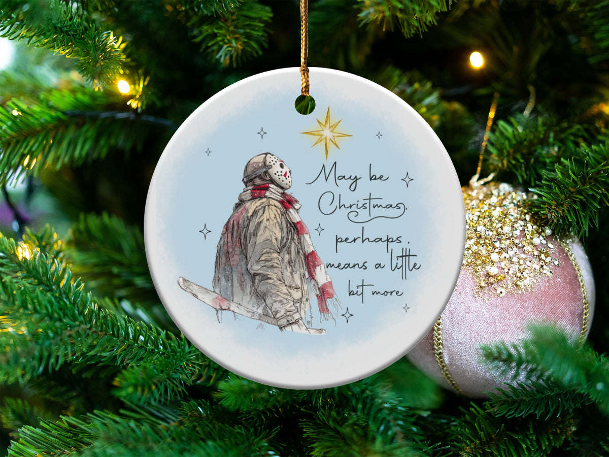 Round ornament with Jason Voorhees and text "May be Christmas, perhaps. means a little bit more."