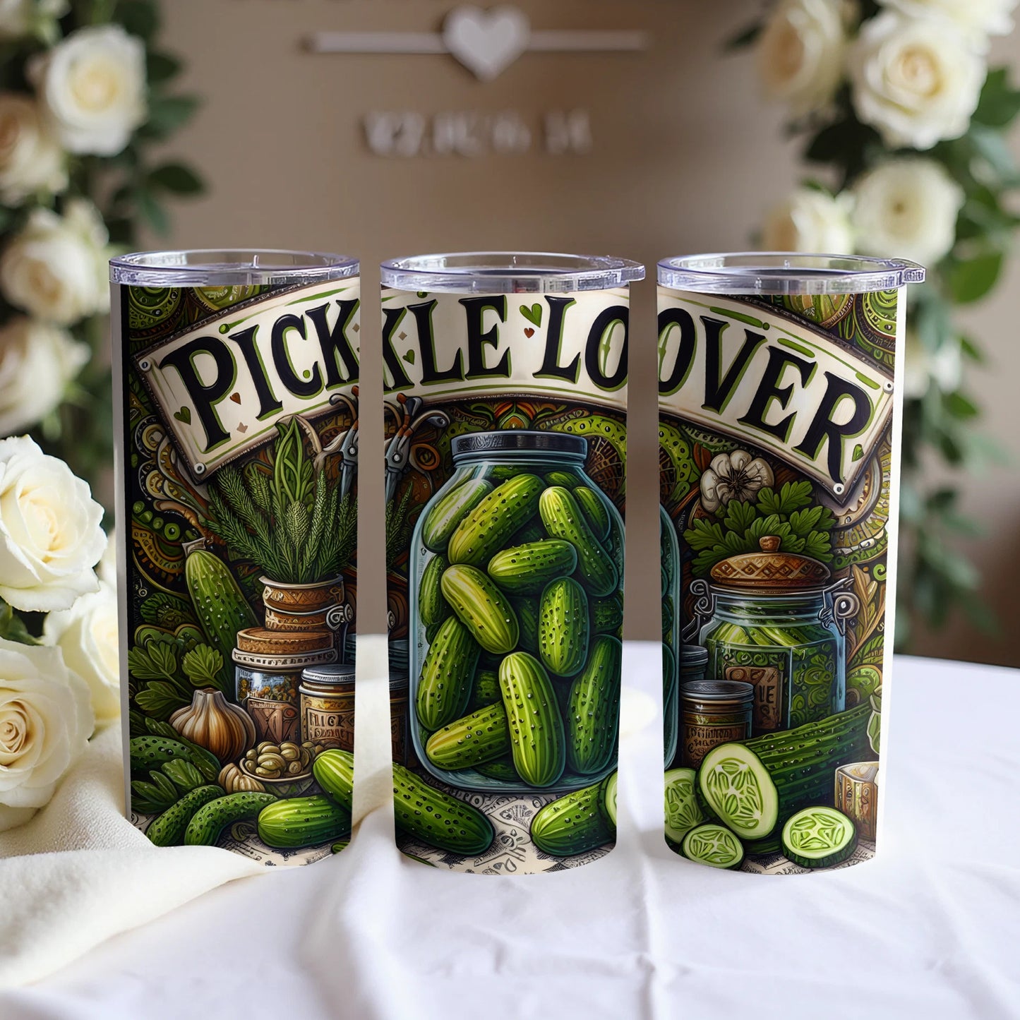 Green pickle design on three tumblers, featuring jars and ingredients.