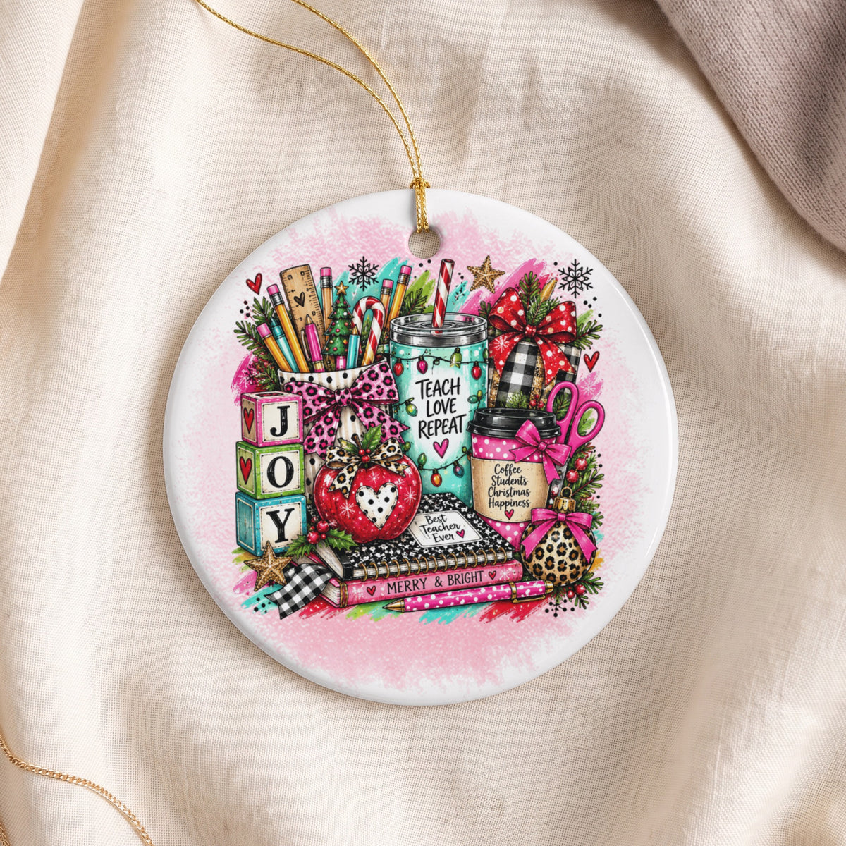Ornament with teacher-themed items, "JOY" blocks, and "Teach Love Repeat" text.