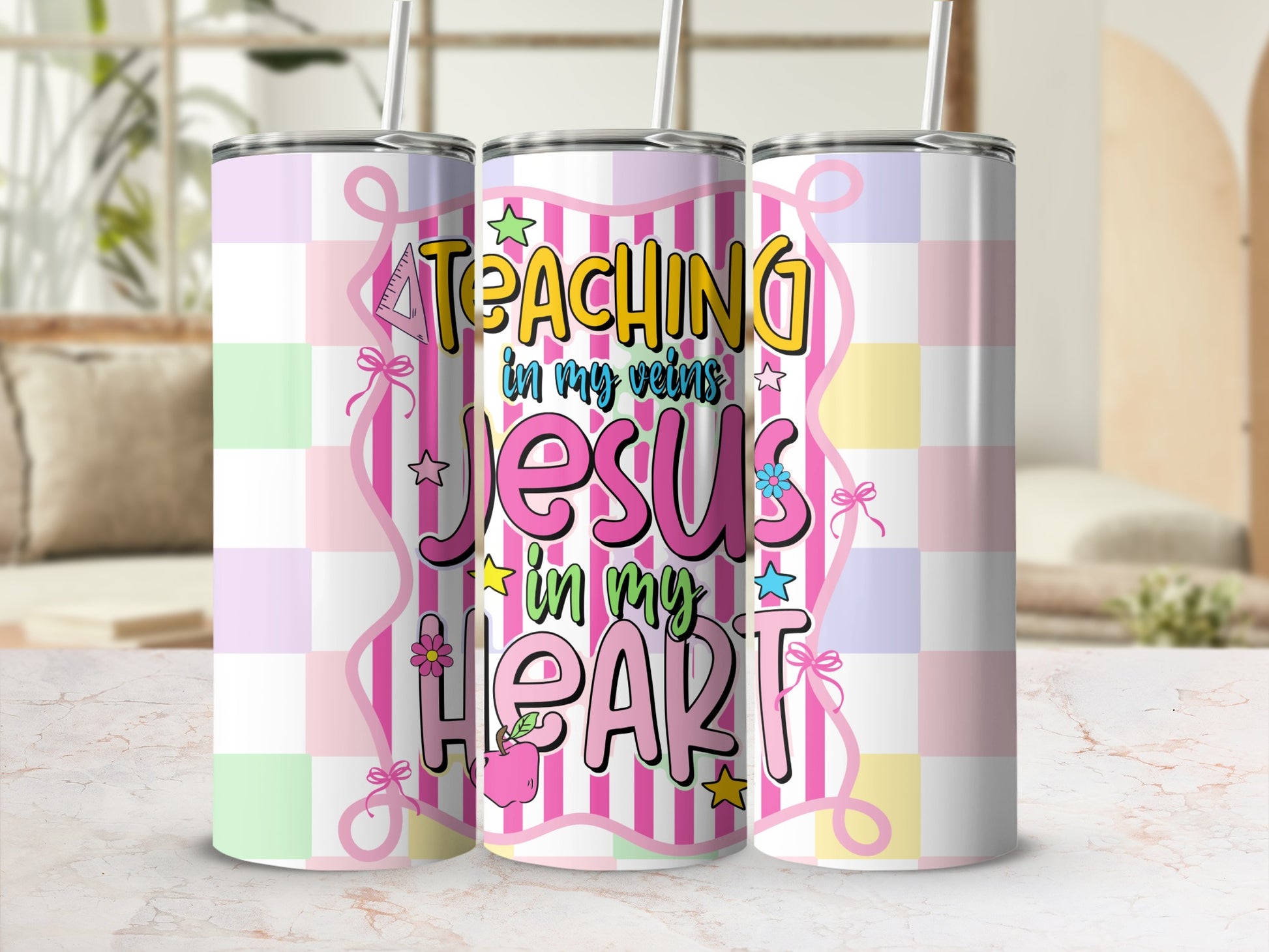 "Teaching in my veins Jesus in my heart" graphic on three tumblers.