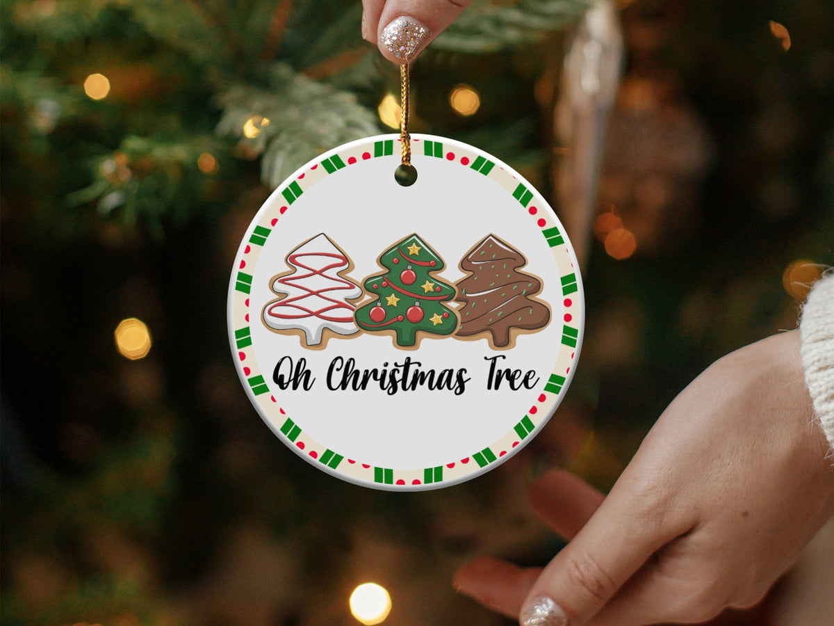 Round Christmas ornament with three cookie trees and "Oh Christmas Tree" text.