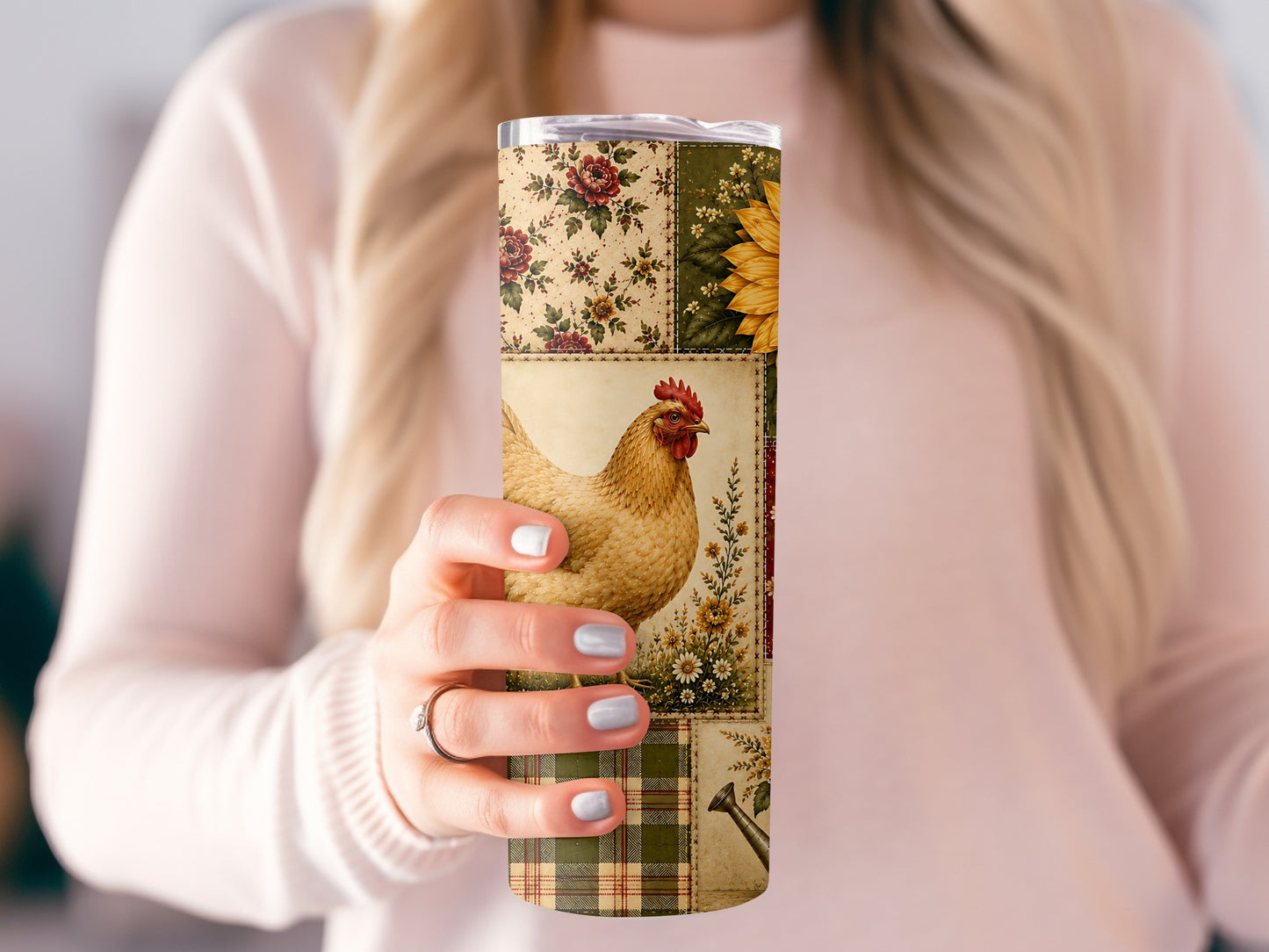 Tumbler with a patchwork design featuring a hen, sunflower, and floral patterns.