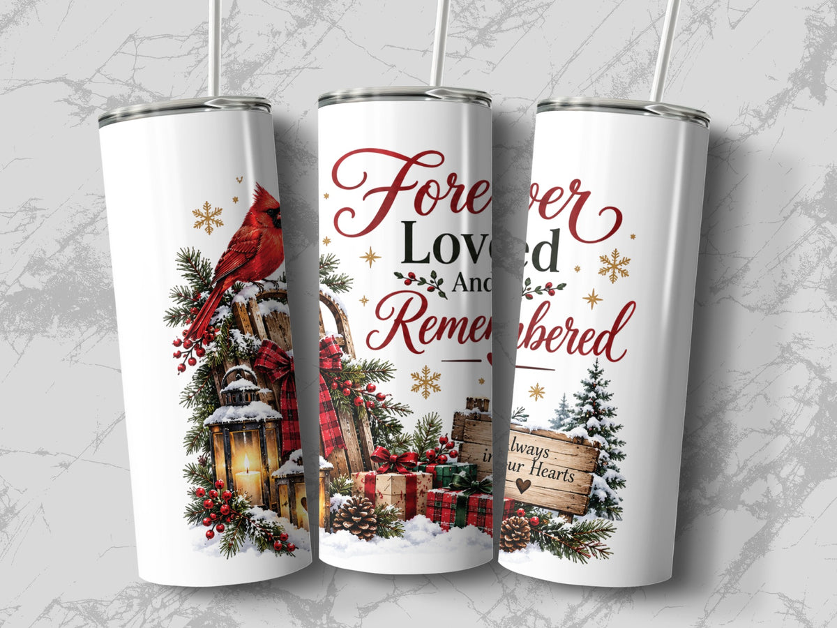 Three tall white tumblers display a winter design featuring red cardinals, snow-covered pine branches, presents, and text.