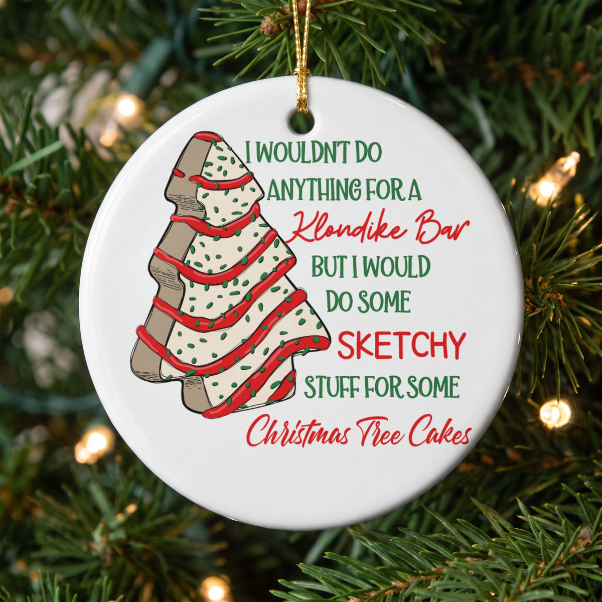 Round ornament with Christmas tree cookie design and text about Klondike Bar vs. Christmas tree cakes.