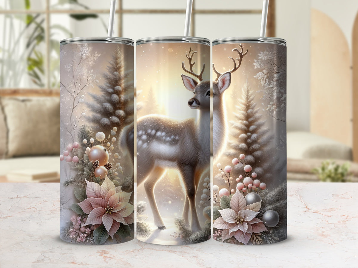 Three tall tumblers with straws, featuring a winter woodland design with a deer, pine trees, and poinsettias.