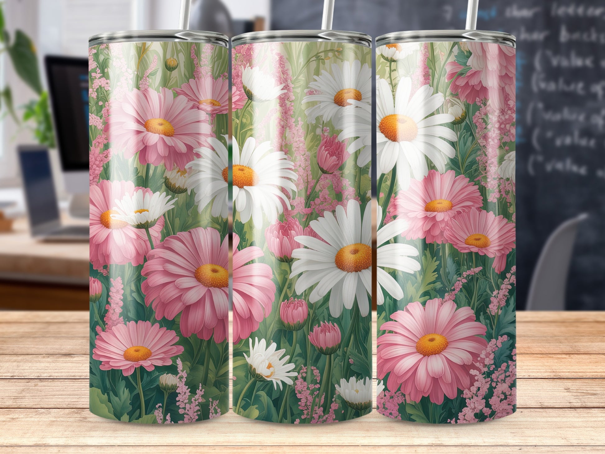 Trio of tumblers with pink and white daisy floral design.