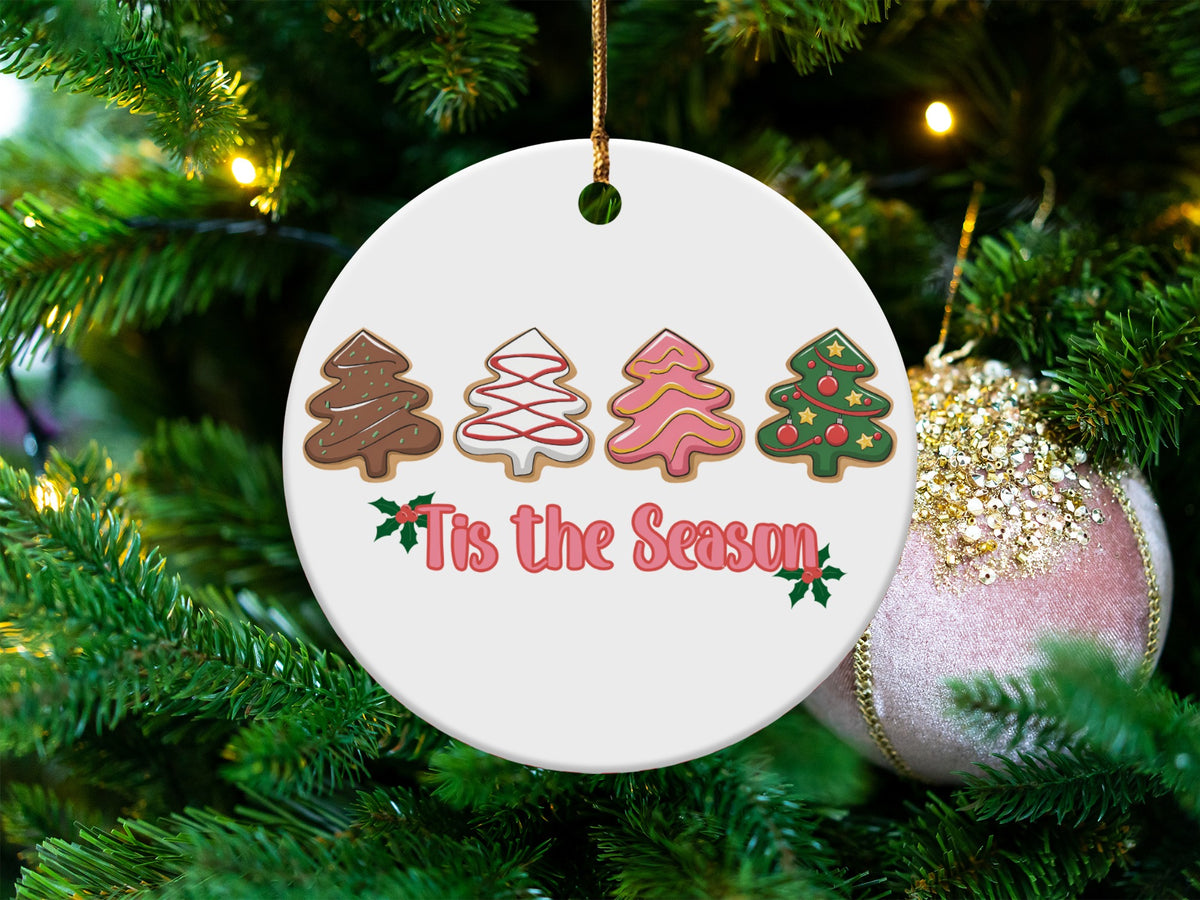 White round ornament with Christmas tree cookies and "Tis the Season" text.