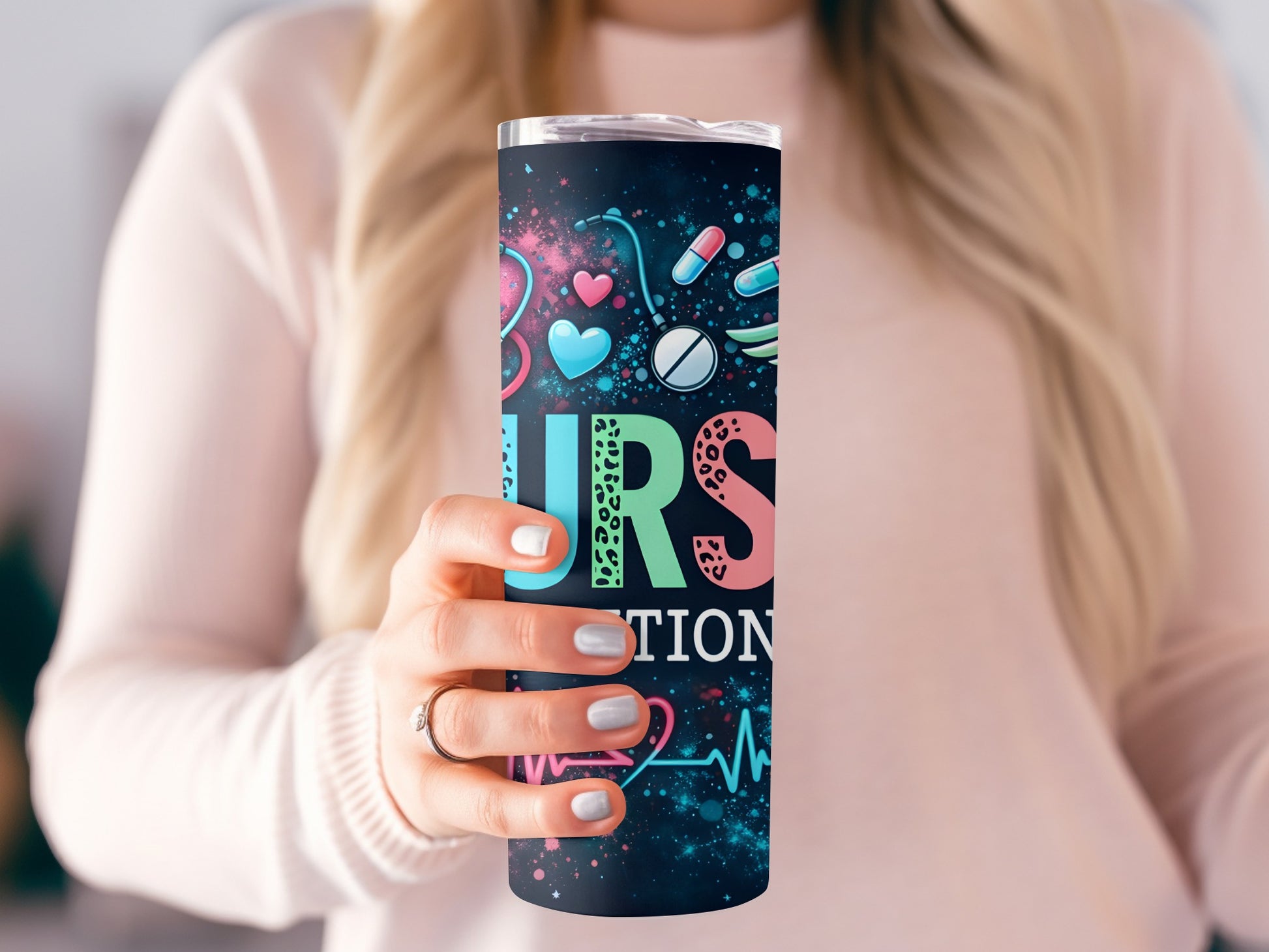 Tumbler with "NURSE" text and medical icons: heart, pills, stethoscope.