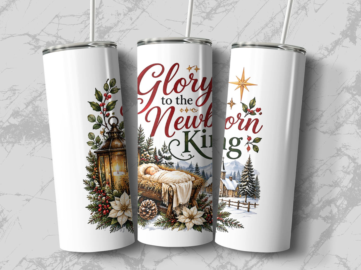 Three white tumblers with lids and straws display a Christmas nativity scene featuring the text Glory to the Newborn King.