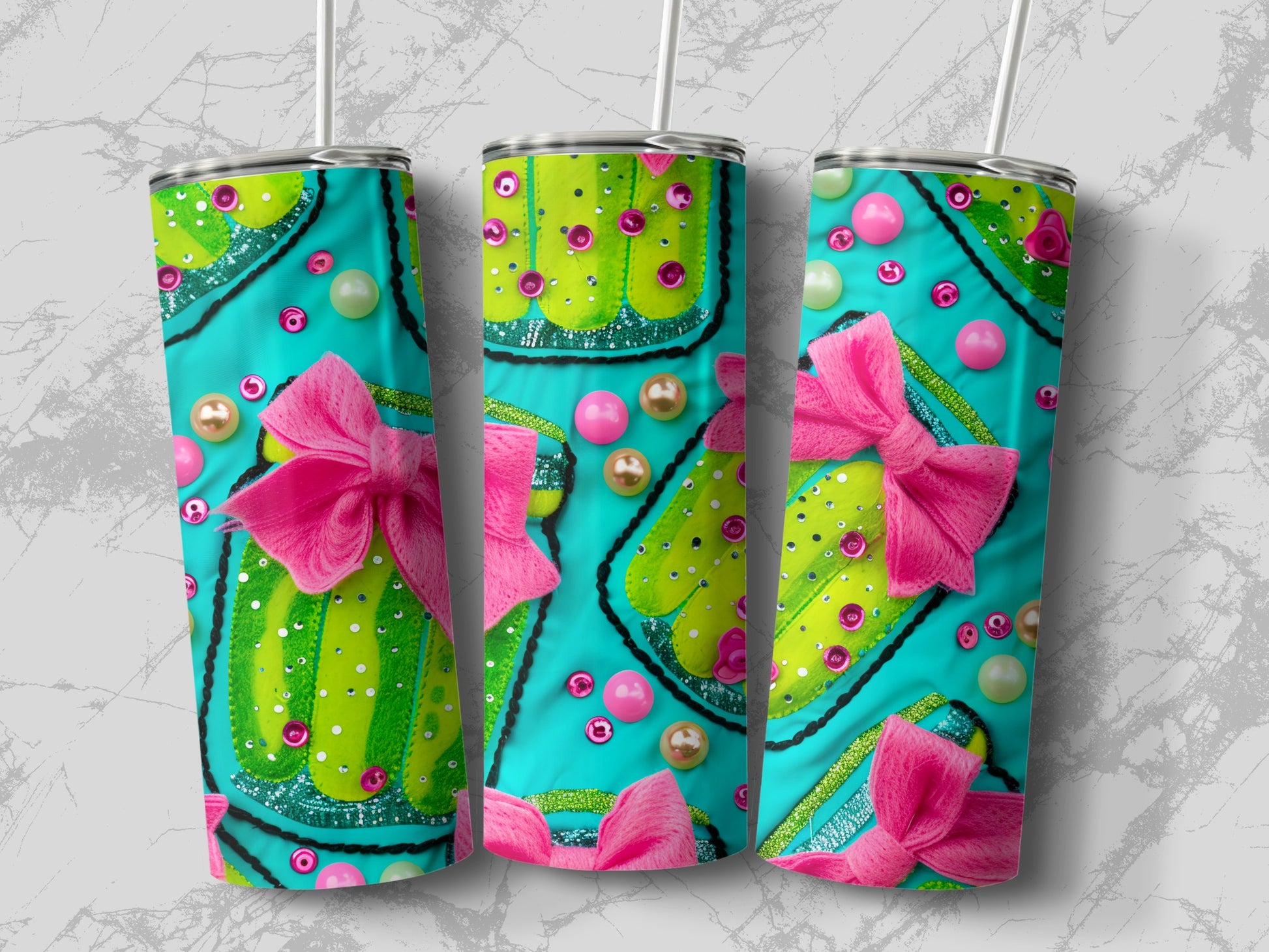 Turquoise tumbler with pink bows and green cactus design.
