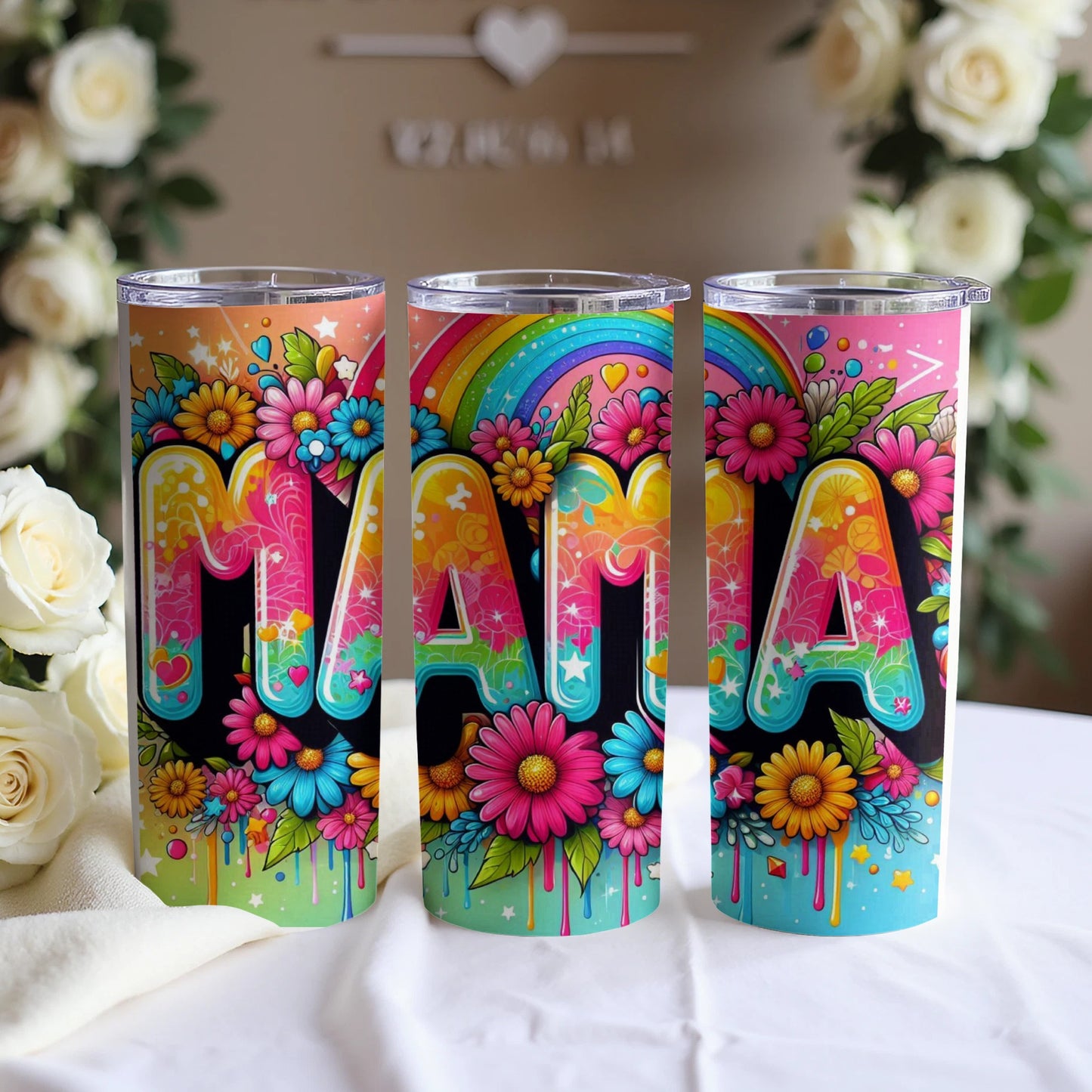 Three tumblers with "Mama" in colorful floral letters and rainbow accents.