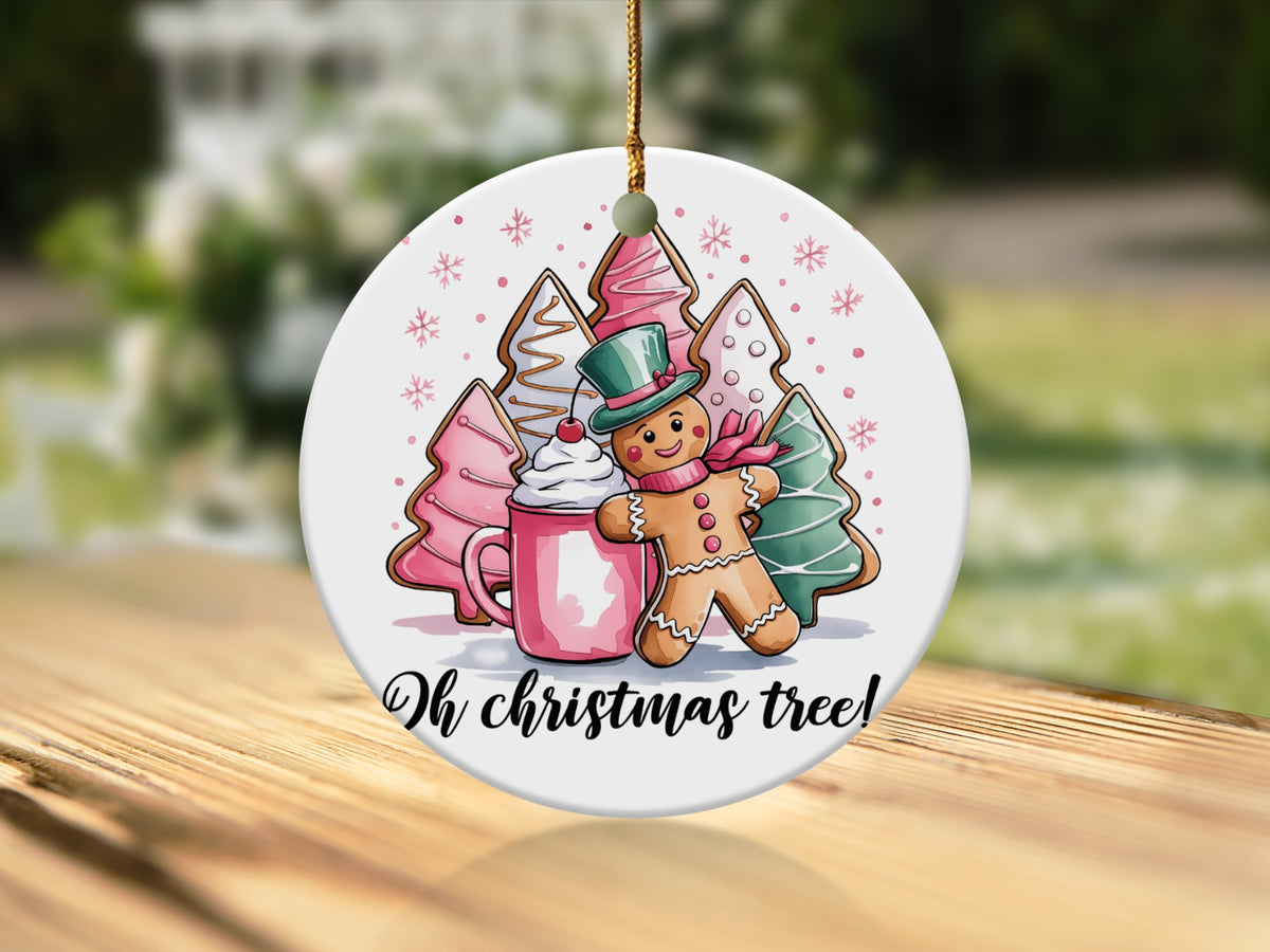 Christmas ornament with gingerbread man, mug, and trees, reads "Oh christmas tree!".