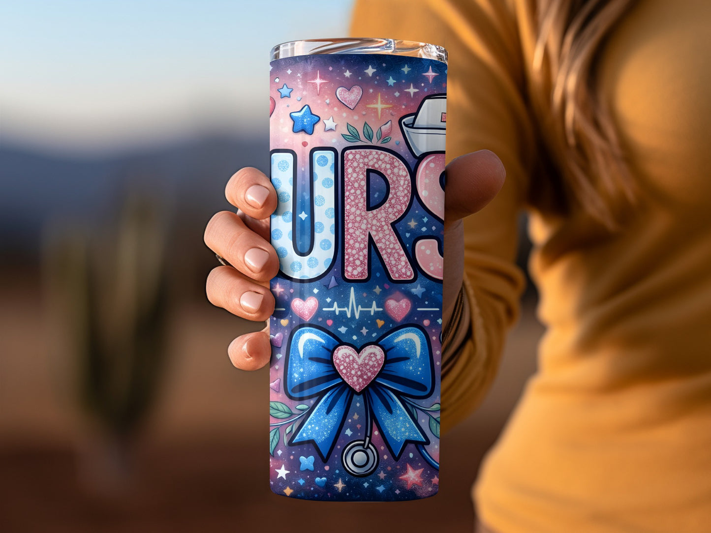 Tumbler with "NURSE" text, stethoscope, hearts, and stars.