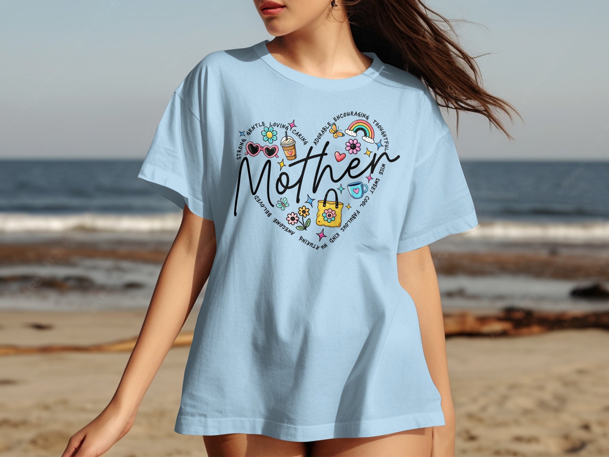 Light blue t-shirt with "Mother" heart graphic with positive words and icons.