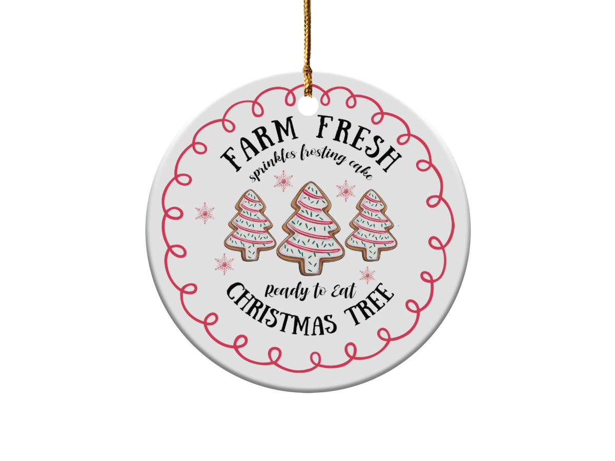 Round ornament with Christmas tree cookies, snowflakes, and text "FARM FRESH ready to eat CHRISTMAS TREE".