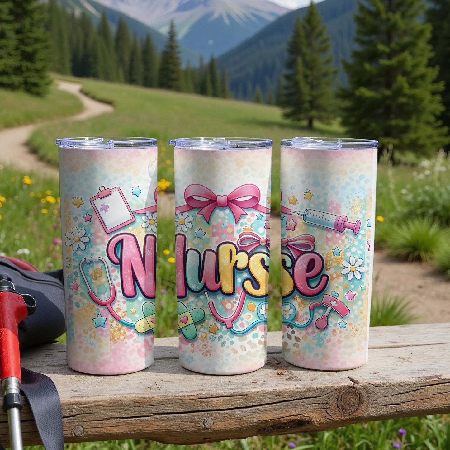 Three nurse-themed tumblers with floral and medical motifs on a wooden surface.