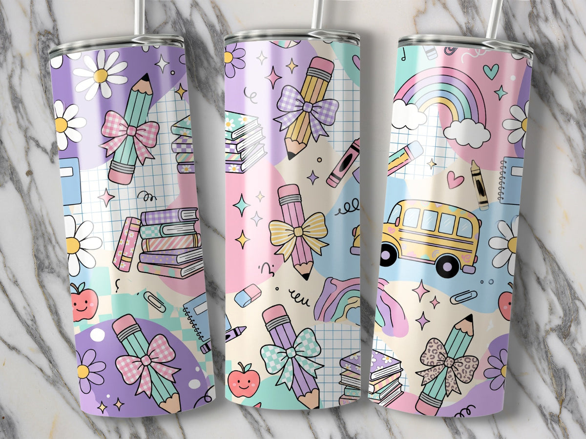 Three matching metal tumblers feature a pastel school-themed pattern with pencils, bows, books, and daisies.