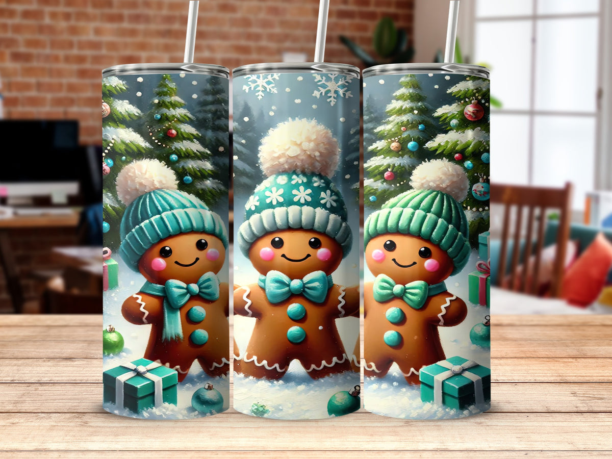 Three matching cylindrical tumblers featuring a snowy winter scene with gingerbread men in teal hats.