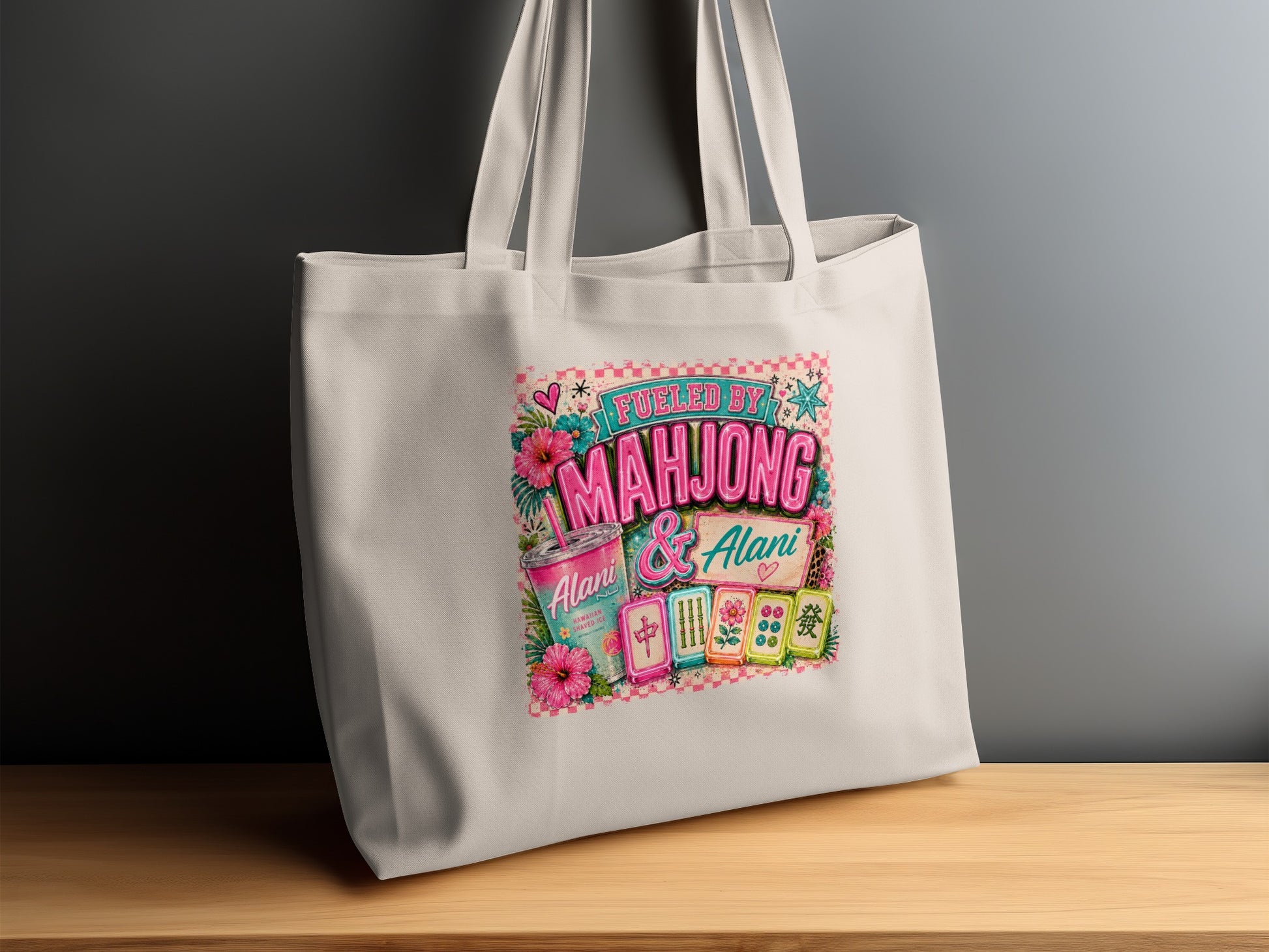 Tote bag with "Fueled by Mahjong & Alani" text and Hawaiian shaved ice graphic.