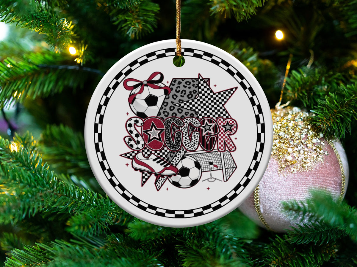 Round soccer ornament with "SOCCER" text, ball, cleat, and net design.