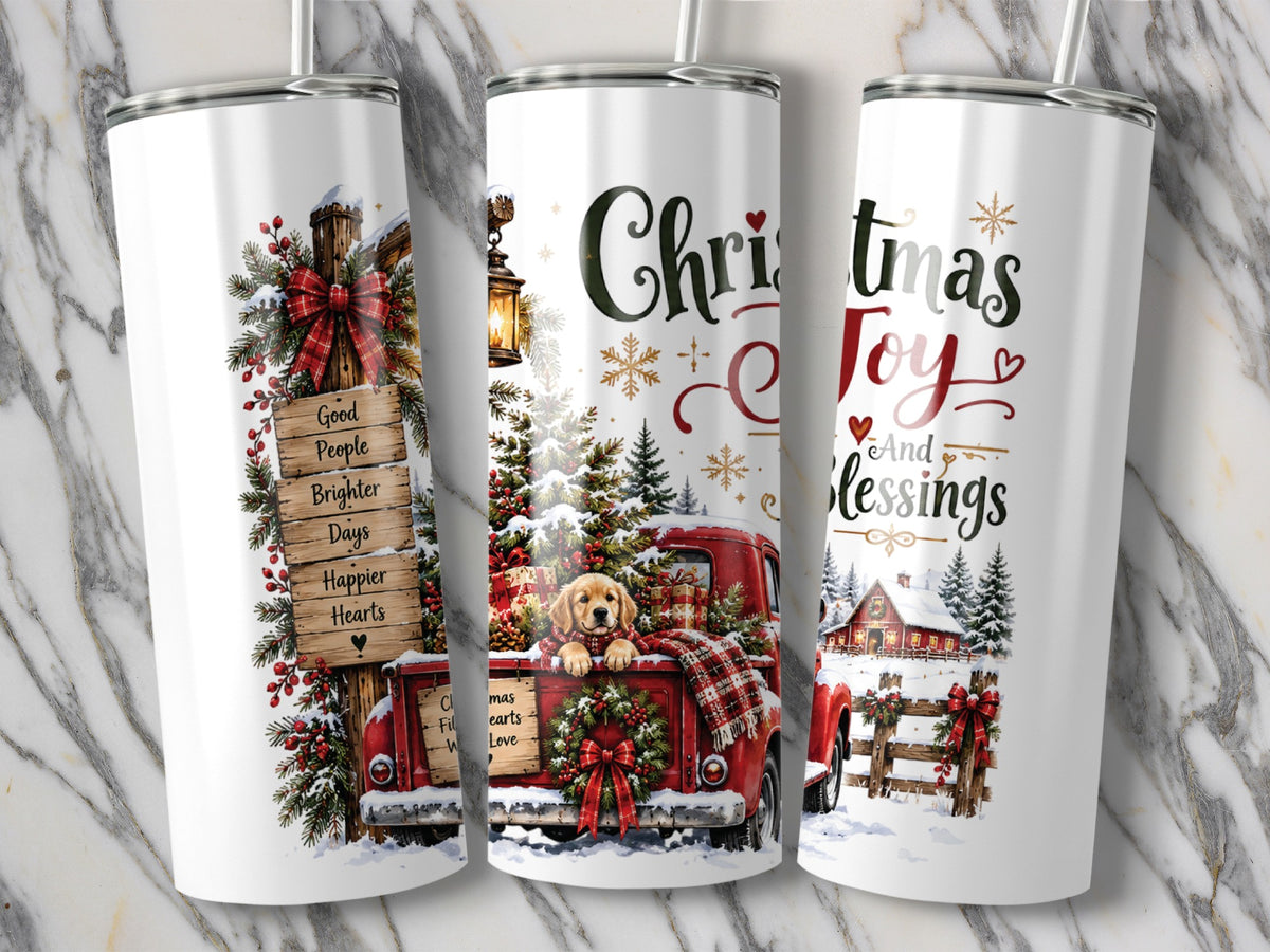 Three white travel tumblers featuring a Christmas design with a red truck, golden retriever puppy, and winter scenes.