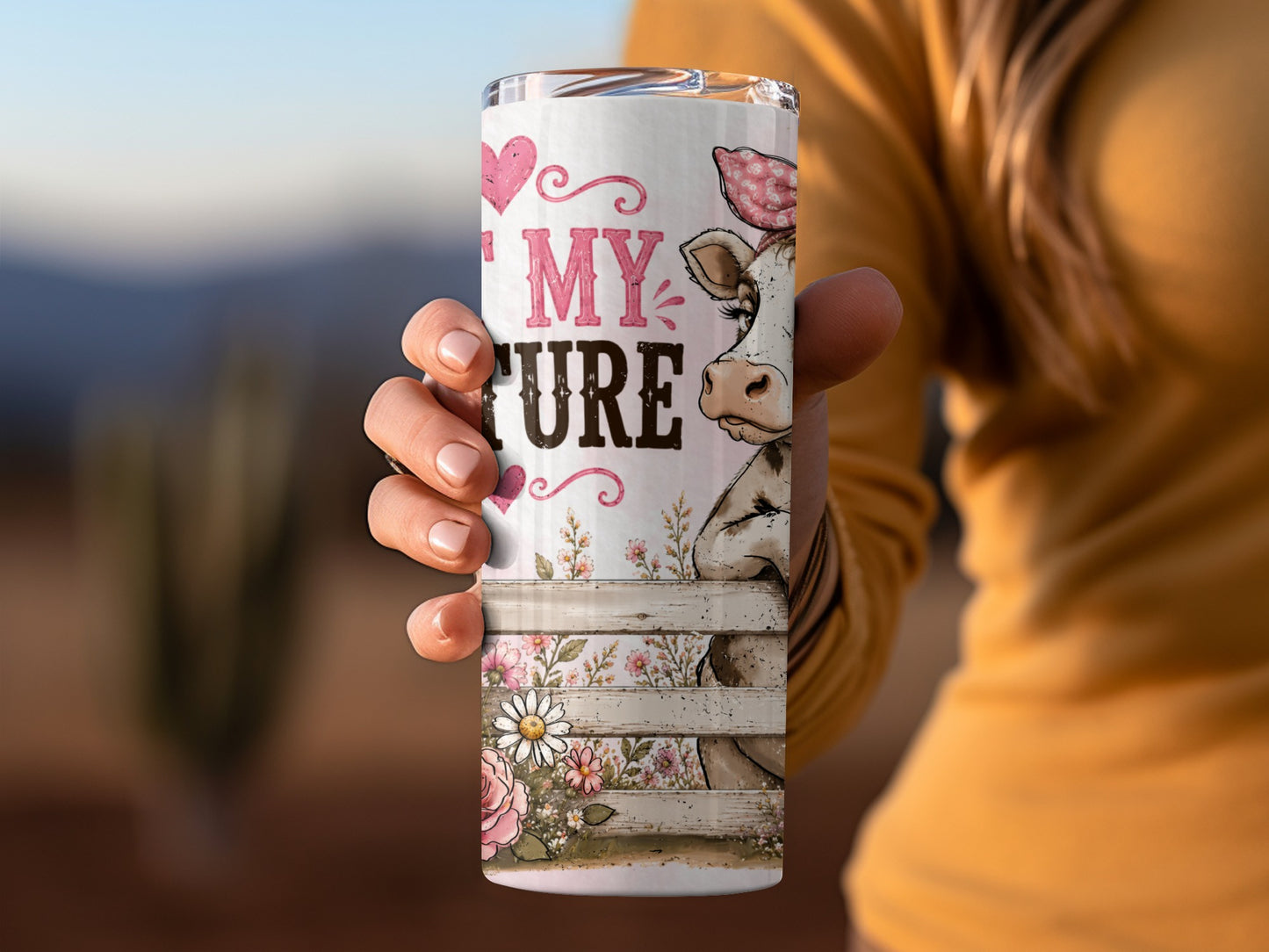 Tumbler with a cow, flowers, hearts, and text "MY FUTURE".