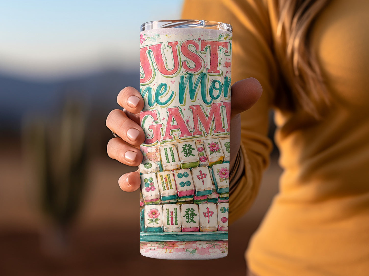 Tumbler with "Just one more game" text and Mahjong tiles.