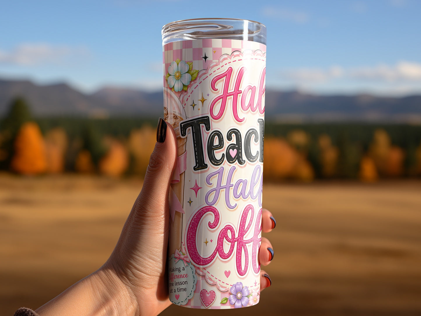 Tumbler with "Half Teacher, Half Coffee" text and floral design, held by a hand.