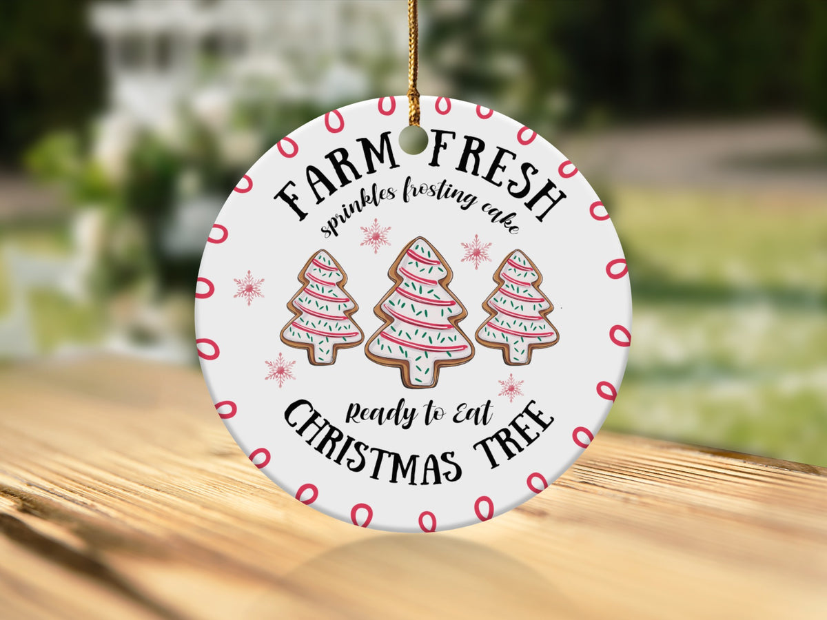 Round ornament with "FARM FRESH" and Christmas tree cookies.