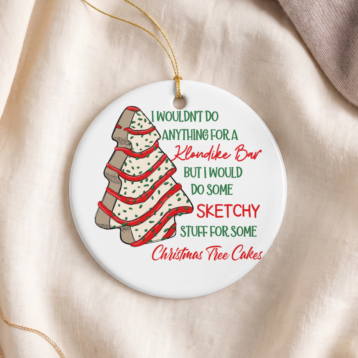 Round ornament with Christmas tree cookie graphic and text about "Christmas Tree Cakes".