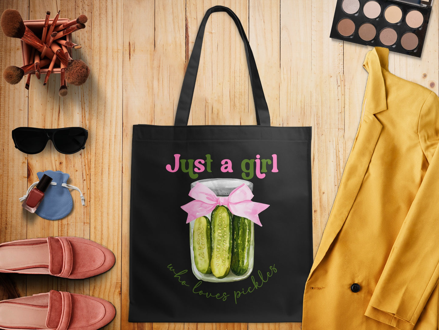 Black tote bag with "Just a girl who loves pickles" and pickle jar graphic.