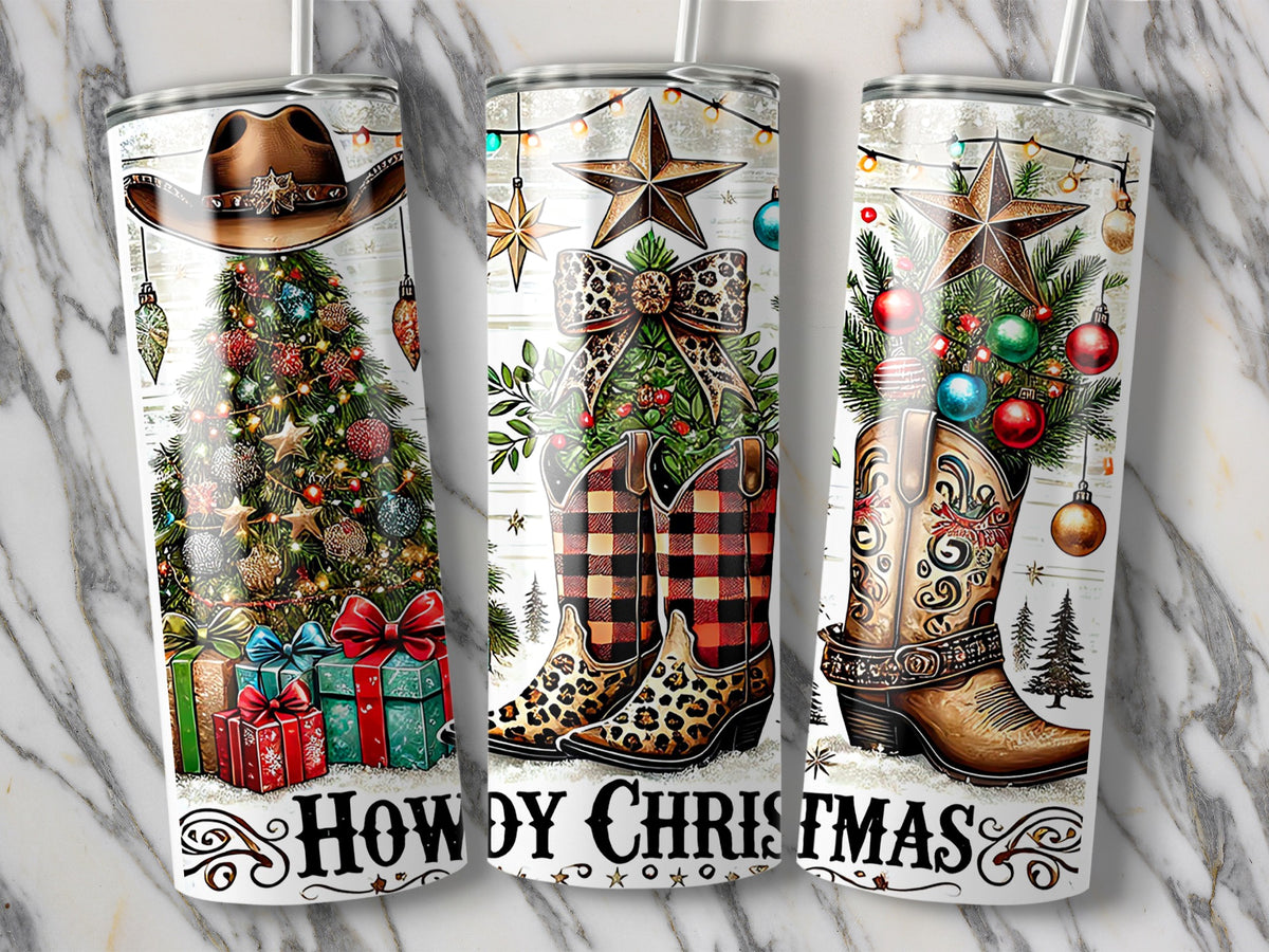 Three cylindrical metal tumblers featuring western-themed Christmas designs with cowboy boots, hats, and trees, inscribed with Howdy Christmas.