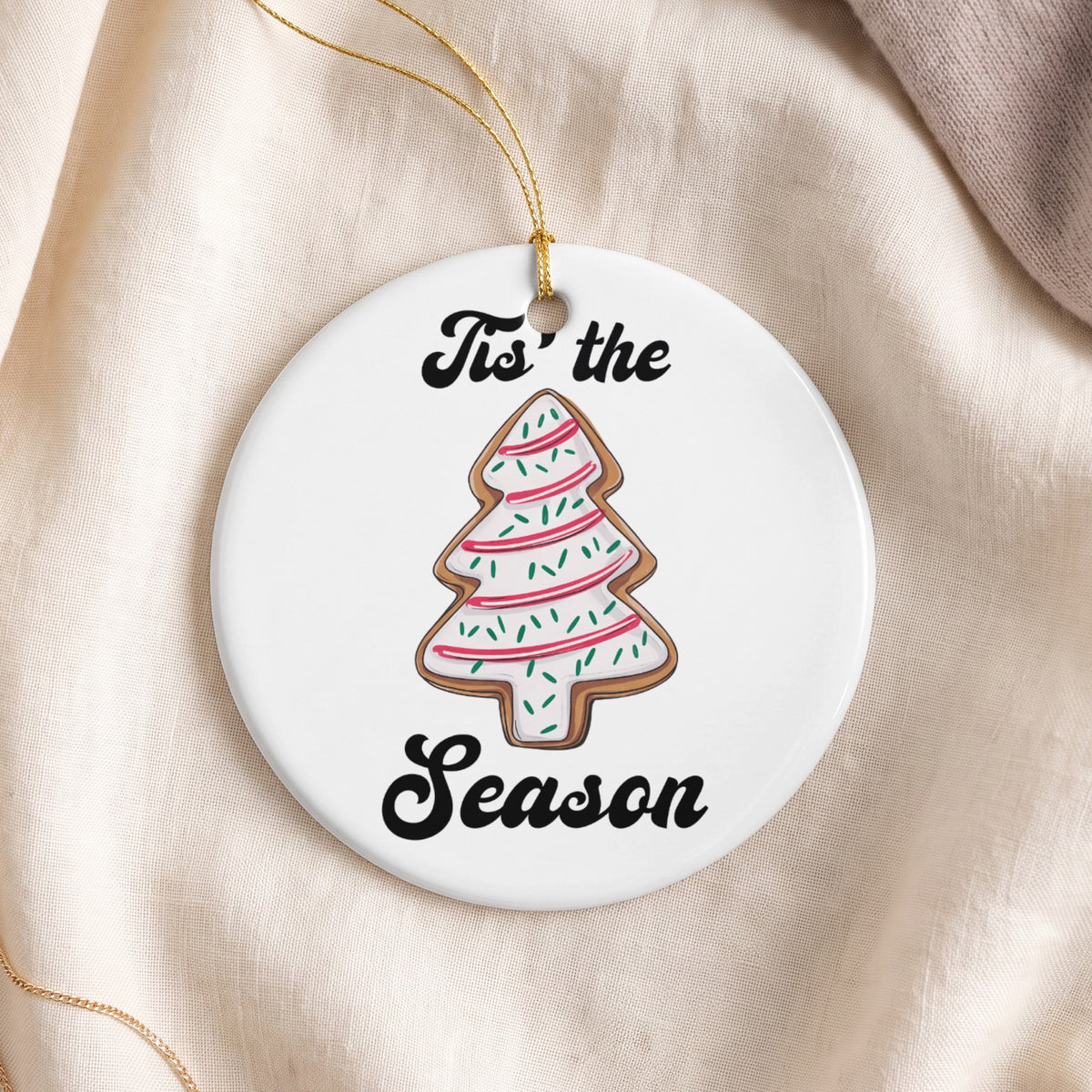 Round ceramic ornament with gingerbread tree graphic and text "Tis' the Season".