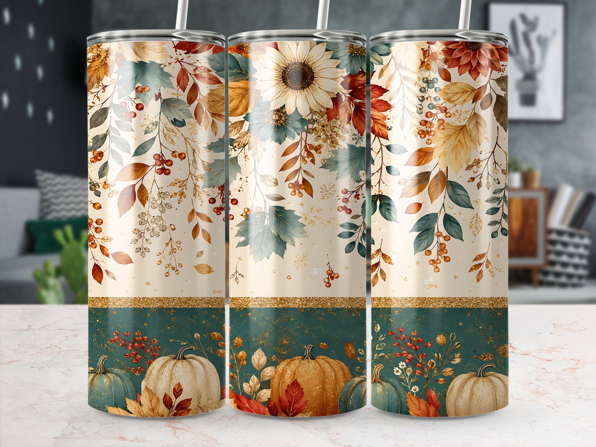 Three tumblers with autumn leaf, sunflower, and pumpkin designs.