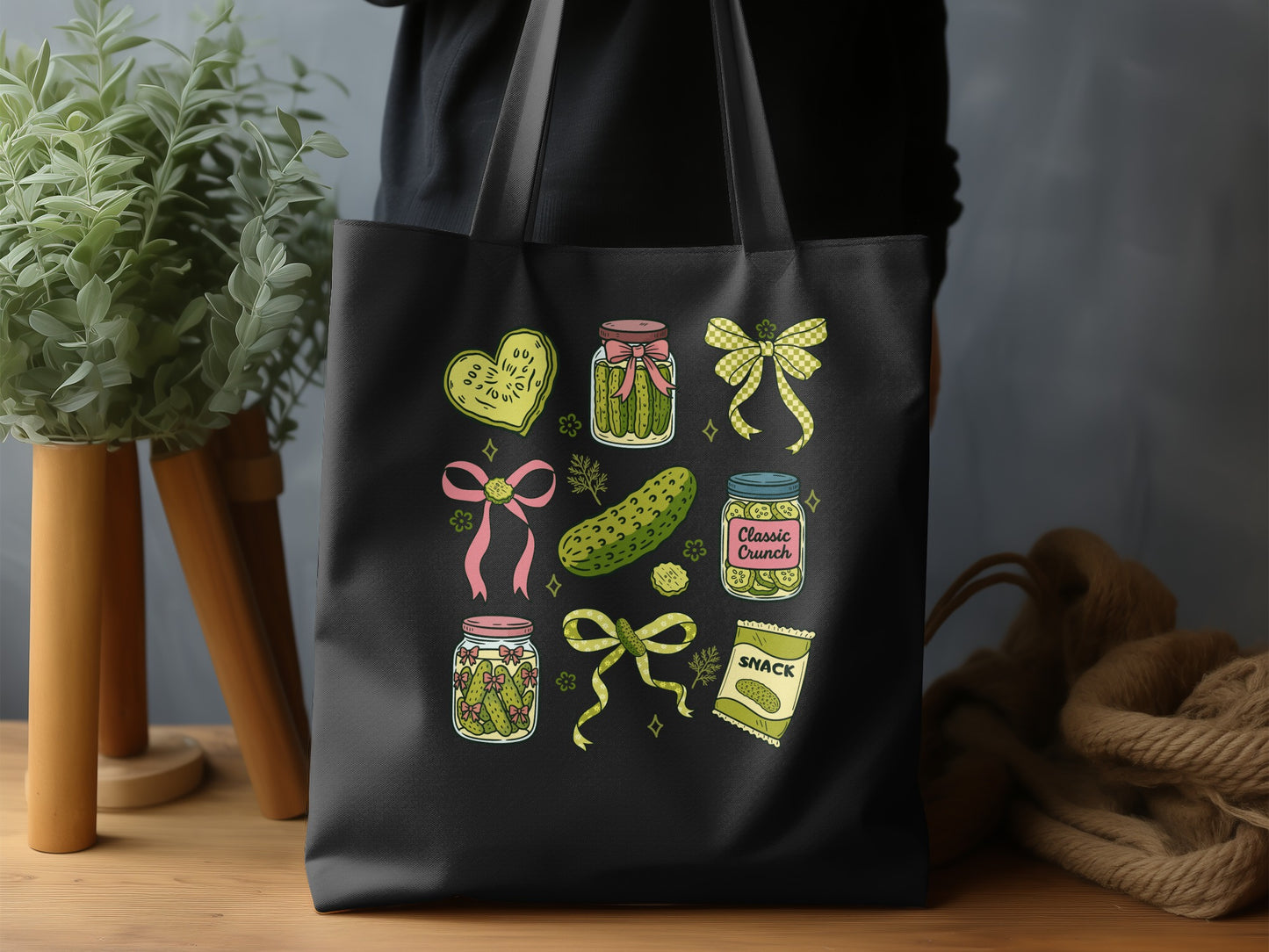 Tote bag with pickle-themed illustrations and text.