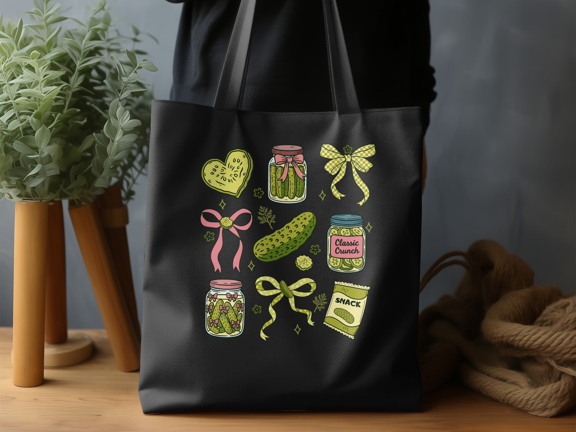 Tote bag with pickle-themed illustrations and text.