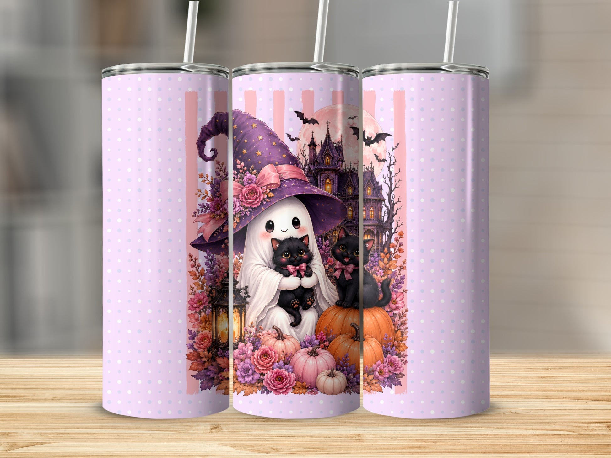 Halloween ghost with witch hat holding kittens surrounded by pumpkins and flowers.