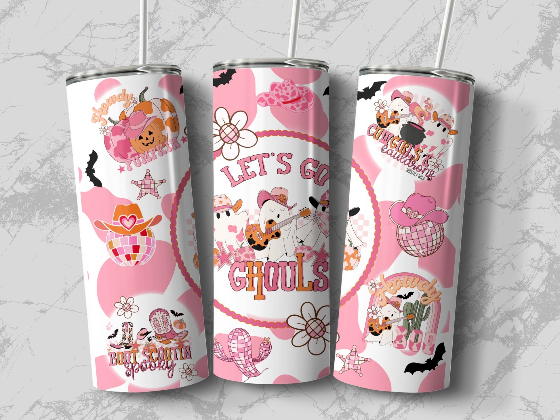 Three tumblers with pink and white cow print, Halloween ghosts, pumpkins, and cowboy hats.