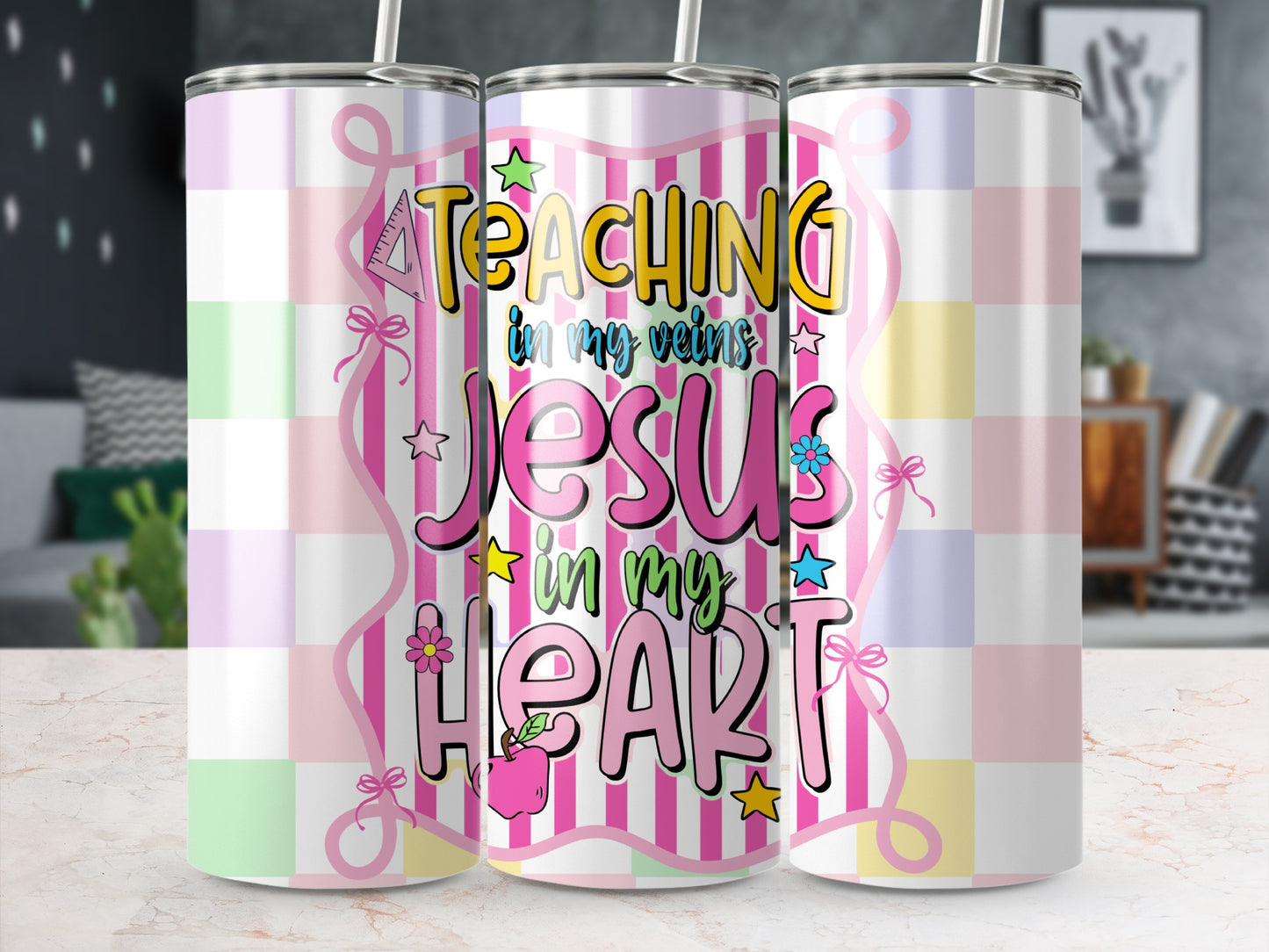 Tumblers with "Teaching in my veins Jesus in my heart" design and pink stripes.