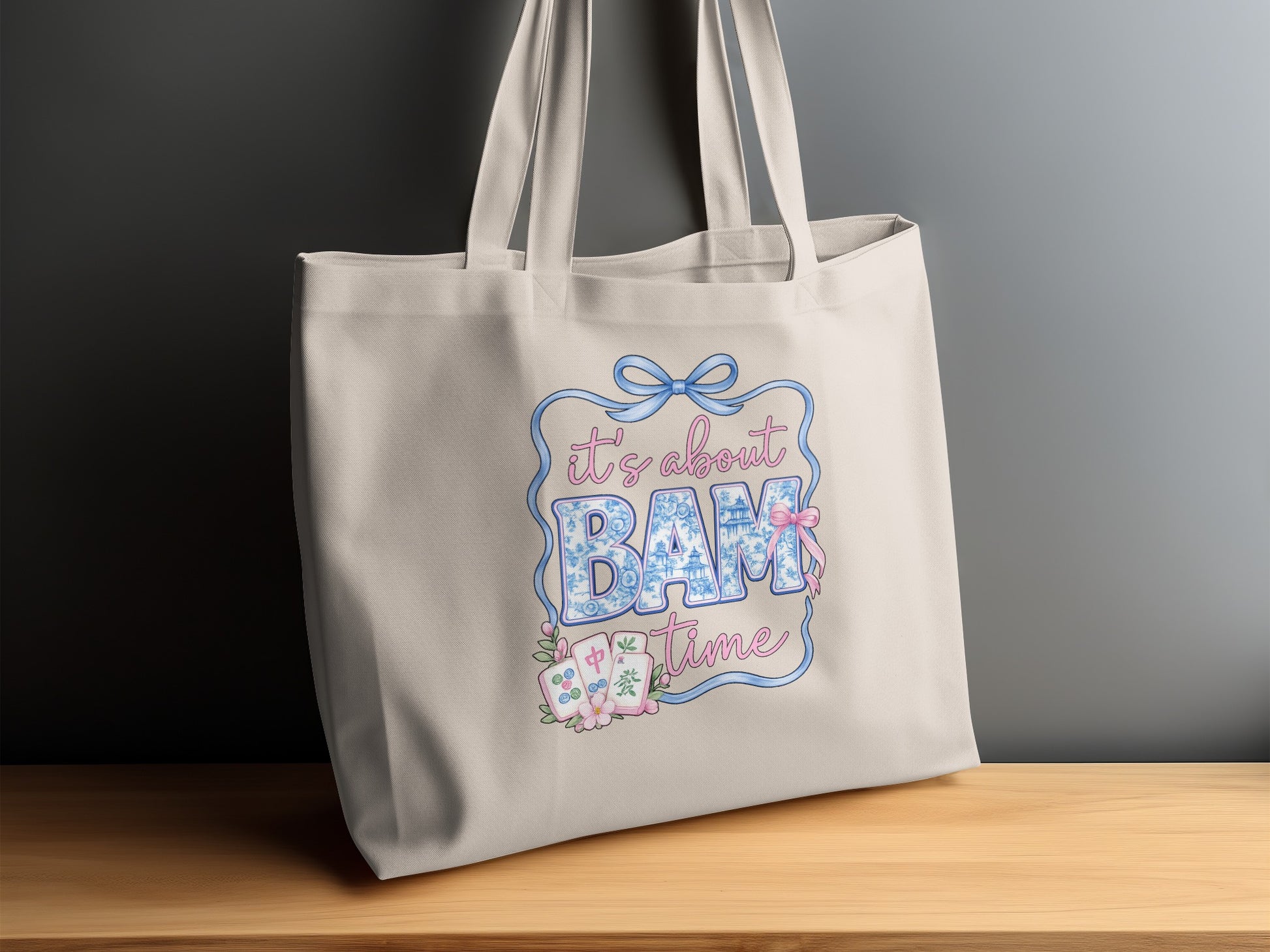 Tote bag with "it's about BAM time" design and mahjong tiles.