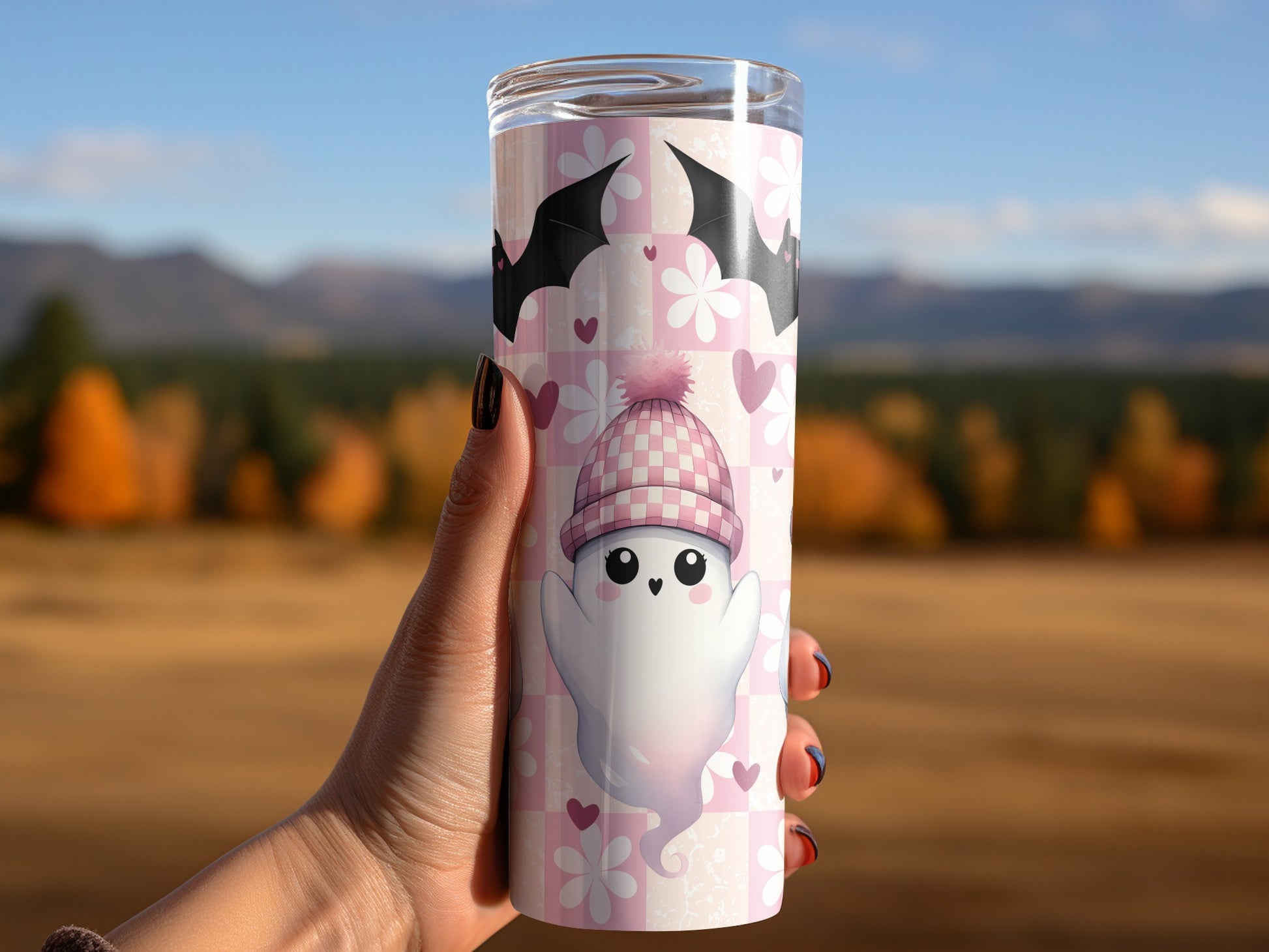 Pink checkered tumbler featuring a cute ghost in a hat with bats and flowers.