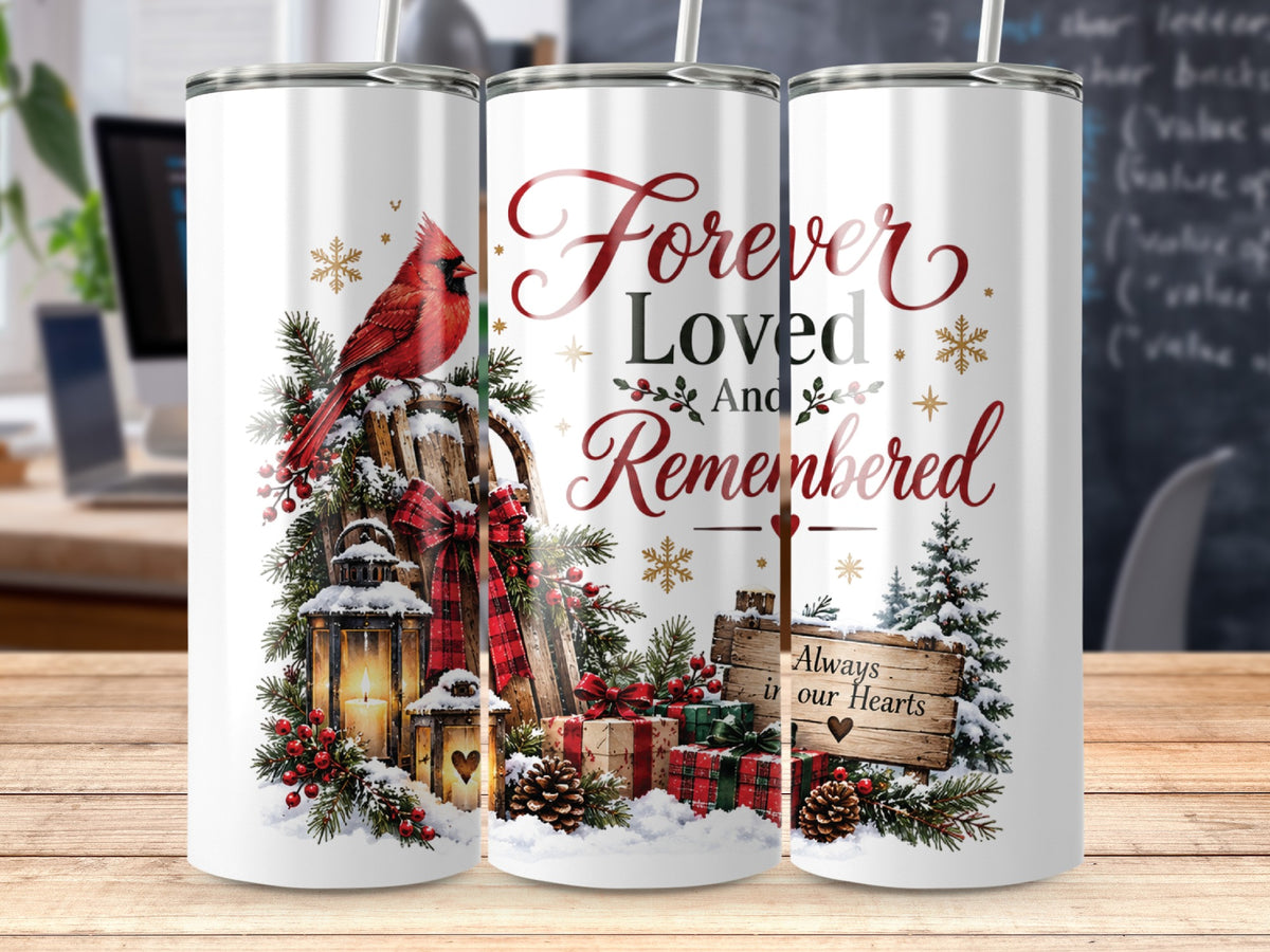 Three views of a white tumbler featuring a winter scene with a cardinal, lantern, and the text Forever Loved And Remembered.