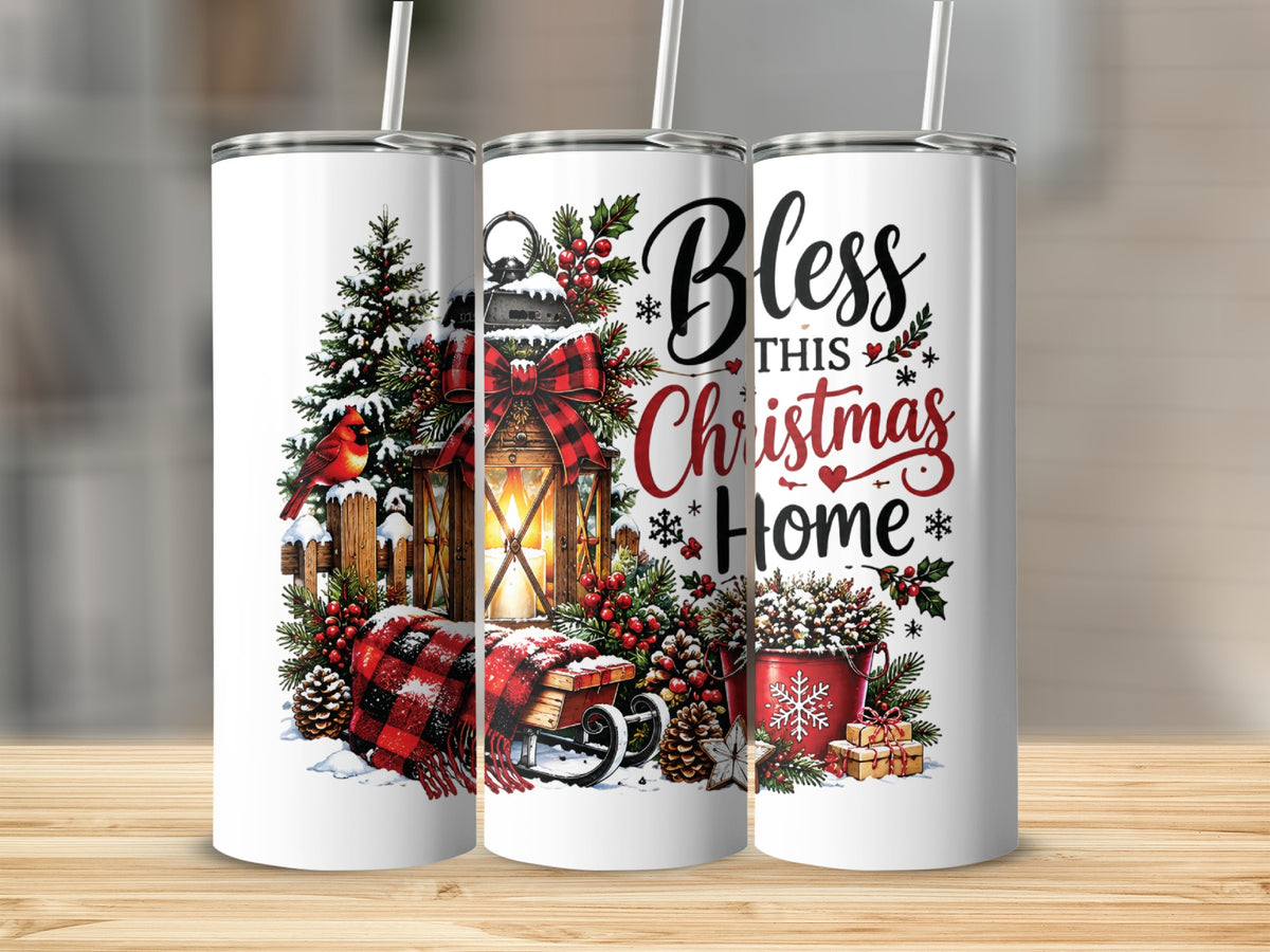 Three tall white tumblers with straws feature a festive winter holiday design including a lit lantern, pine trees, and the text "Bless This Christmas Home."