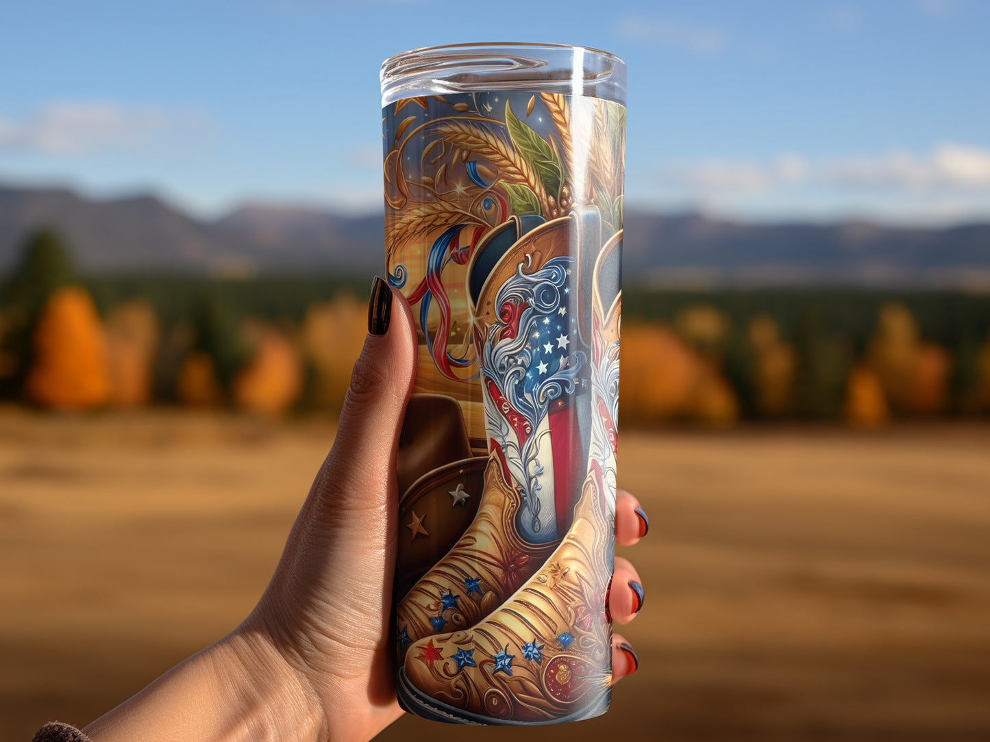 Hand holding tall tumbler with patriotic boot and stars design.