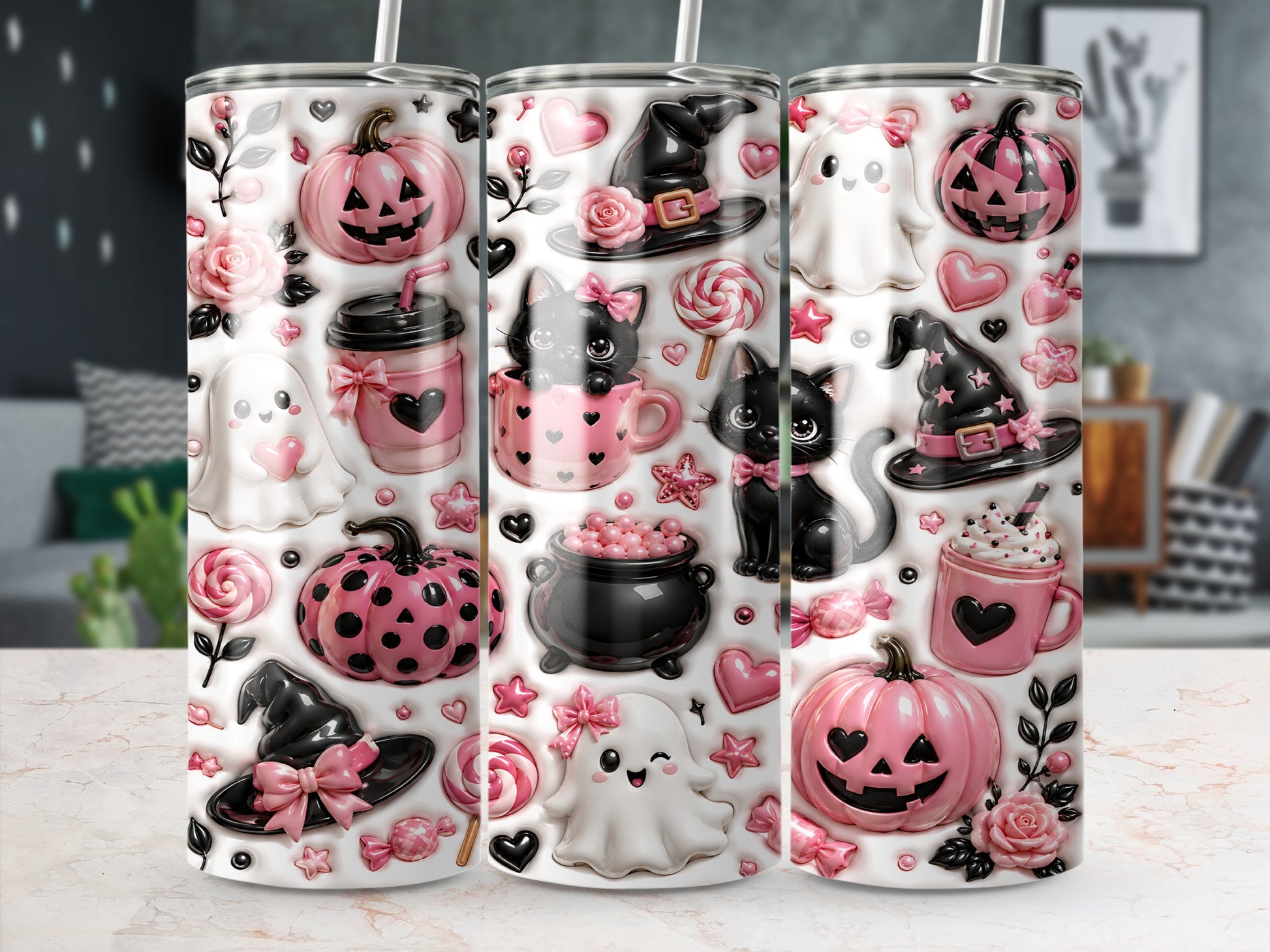 Pink and black Halloween themed tumbler with ghosts, pumpkins, cats, and witches' hats.