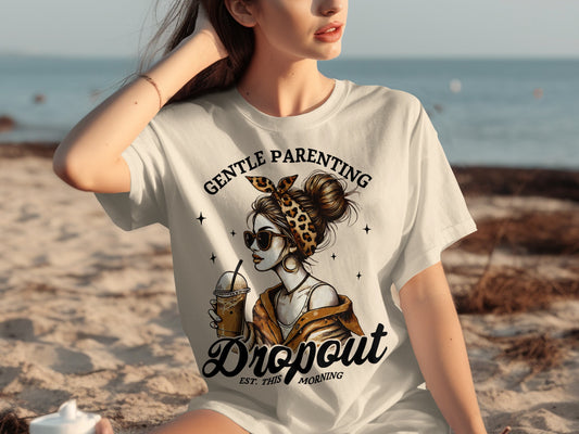 Woman in graphic t-shirt with "Gentle Parenting Dropout" text and leopard print.