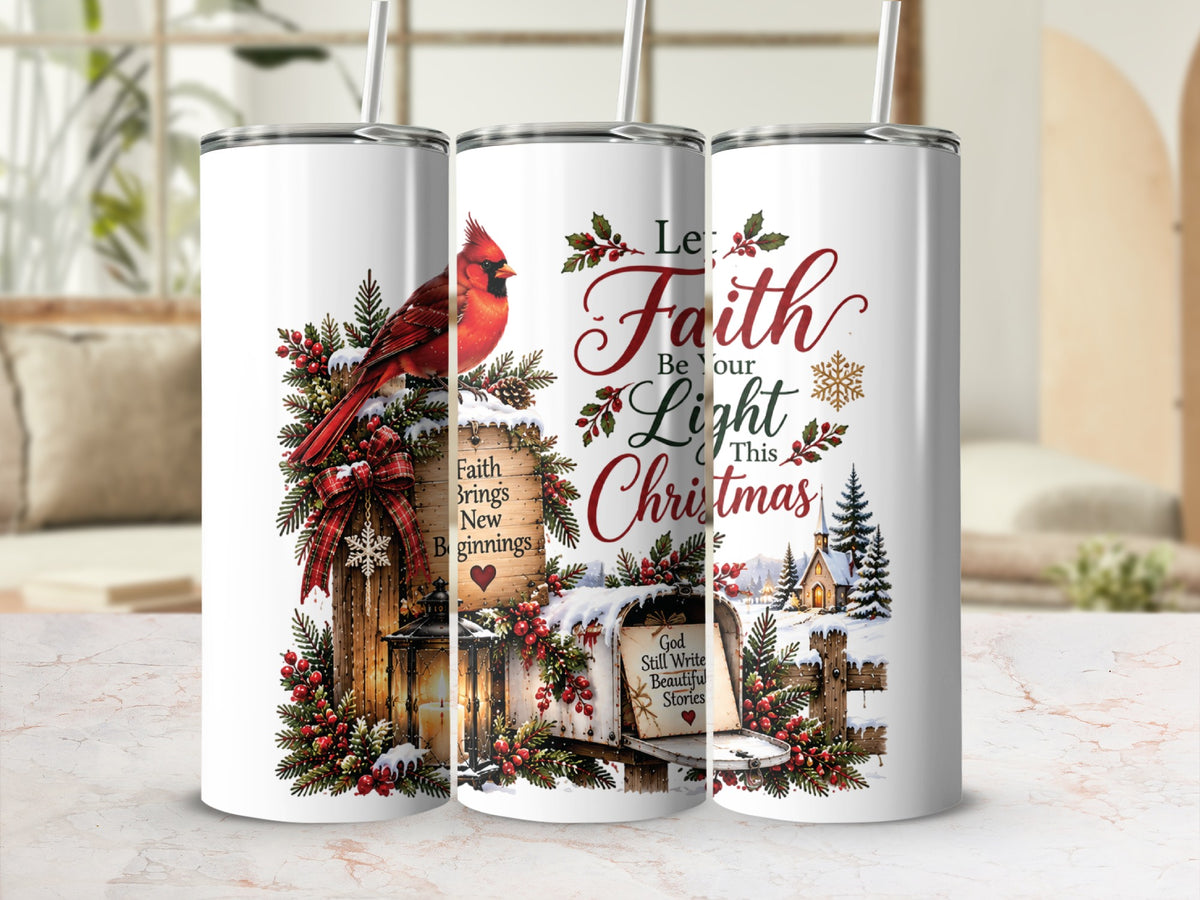 Three tall, white tumblers with straws feature a festive winter design depicting a red cardinal, holly, and the text "Let Faith Be Your Light This Christmas."