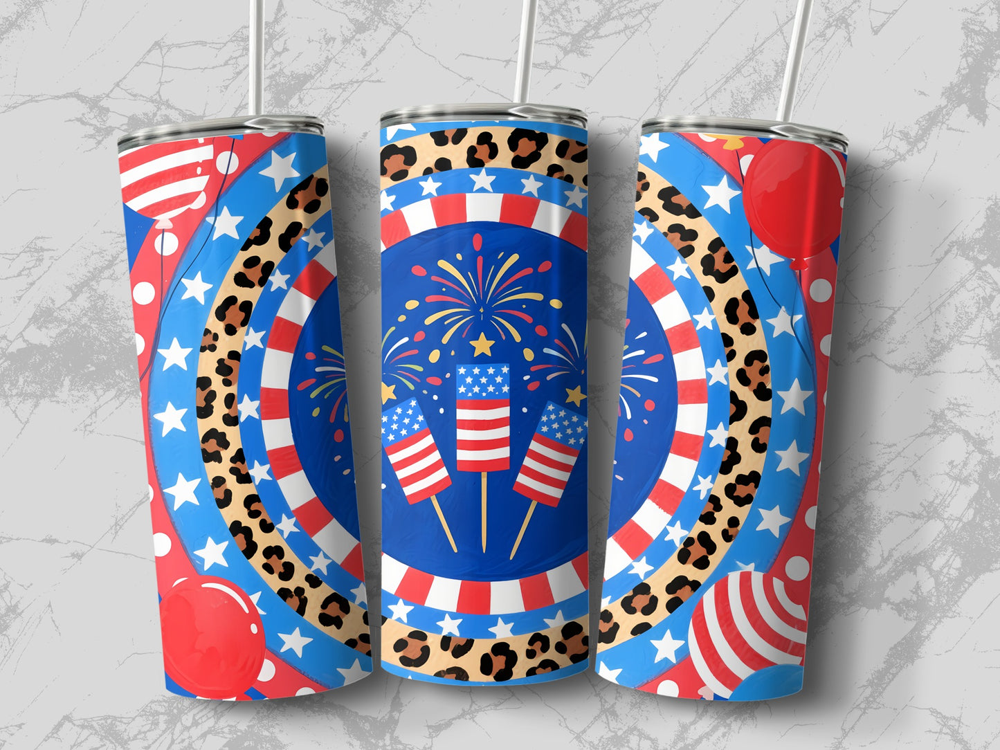 Three patriotic tumblers with fireworks, stars, and balloons on a marbled background.